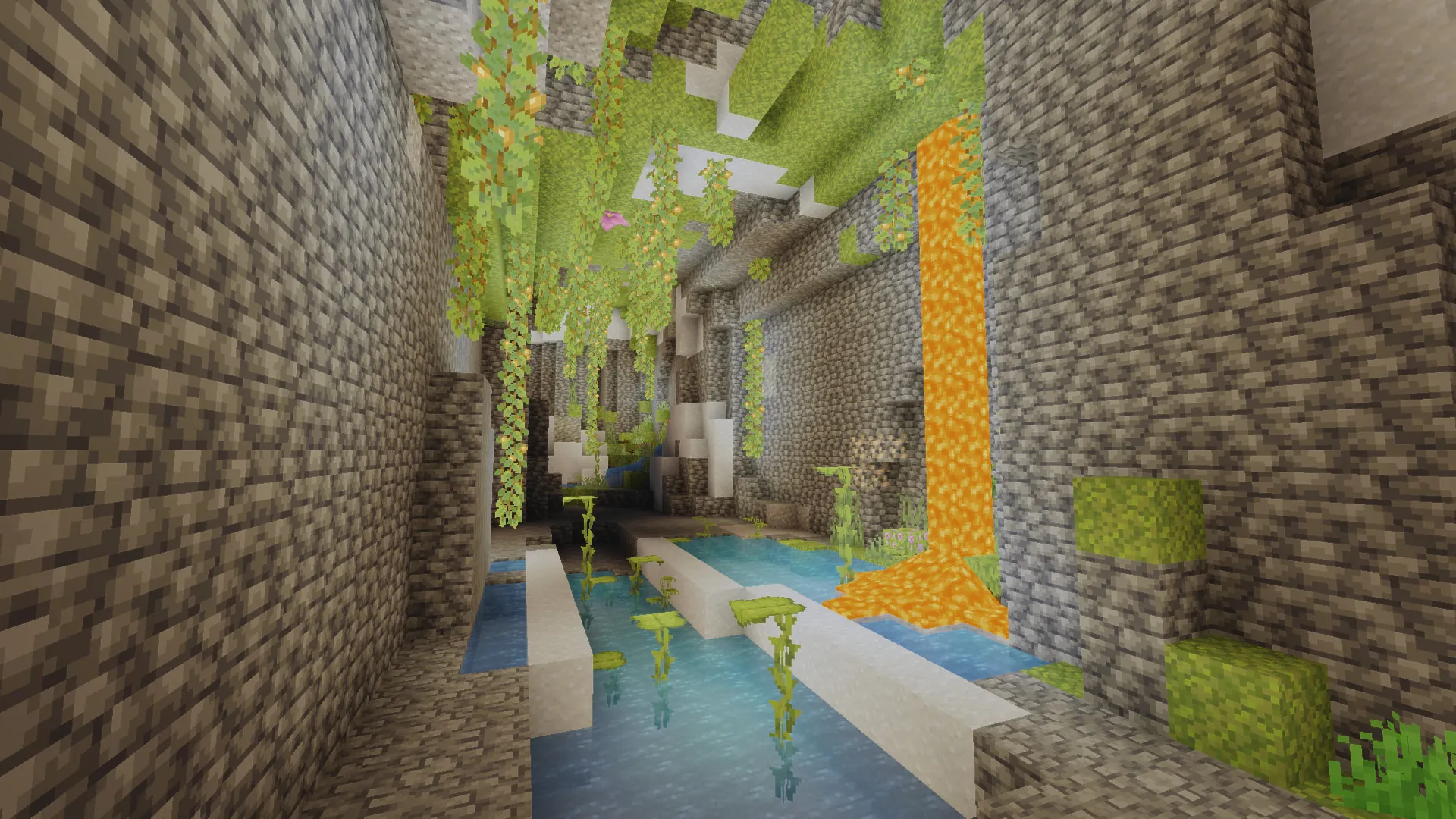 A luscious cave exposing expansive lighting. This image is including moss, glow berries, and lava as the main showcase.